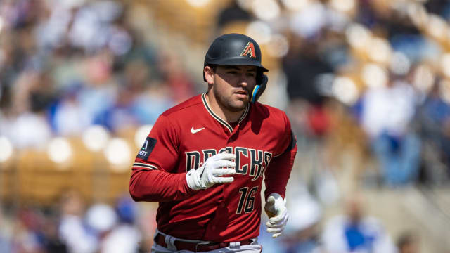Buddy Kennedy running during Spring Training
